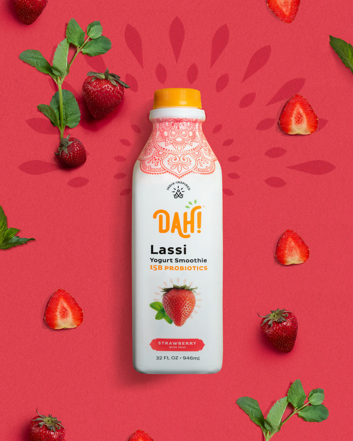 dah! strawberry with mint lassi yogurt smoothie surrounded by strawberries and mint leaves